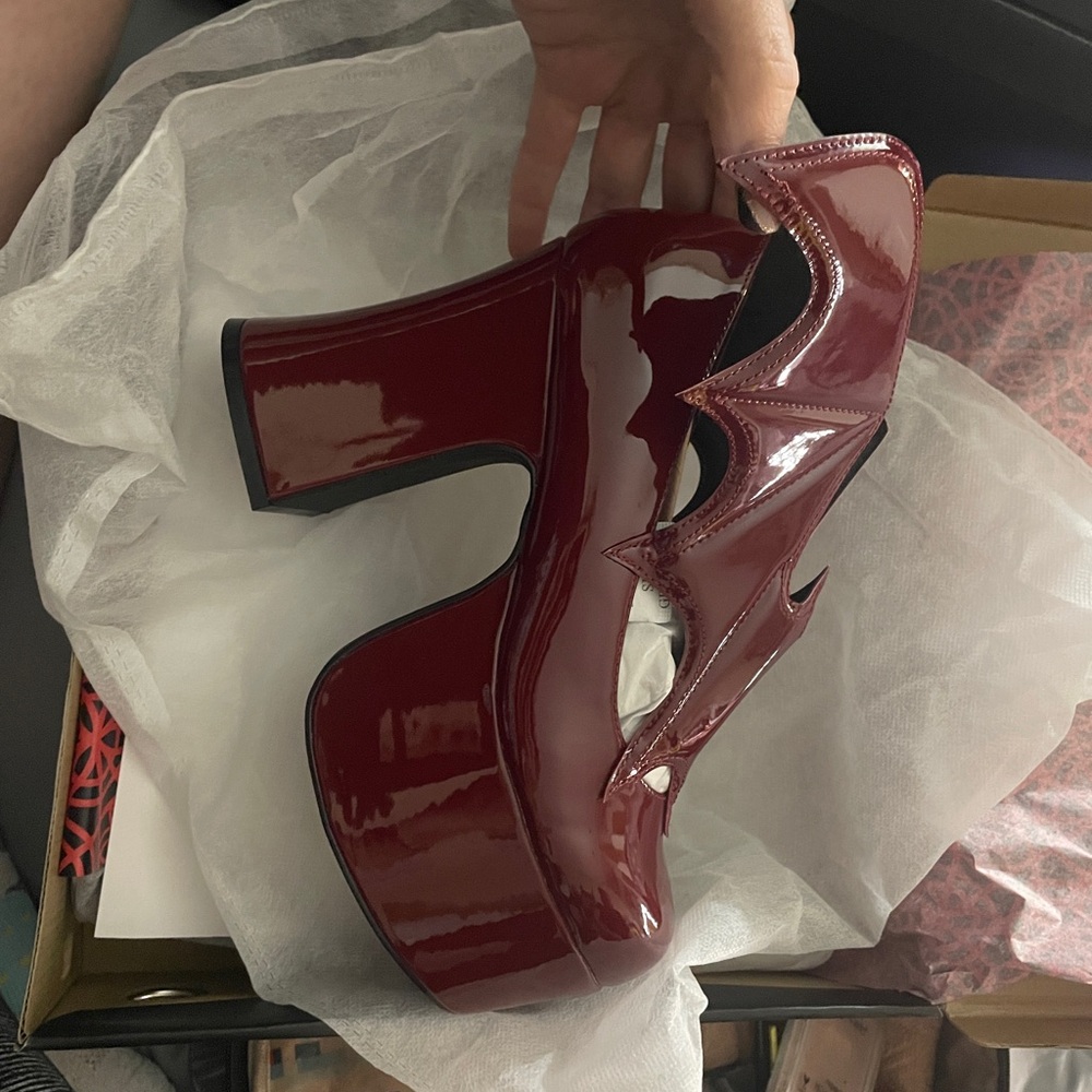 STRANGE CVLT, burgundy Platform Heels with Bath wings